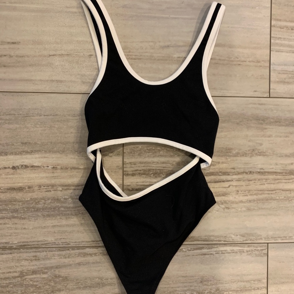 Out from under body suit